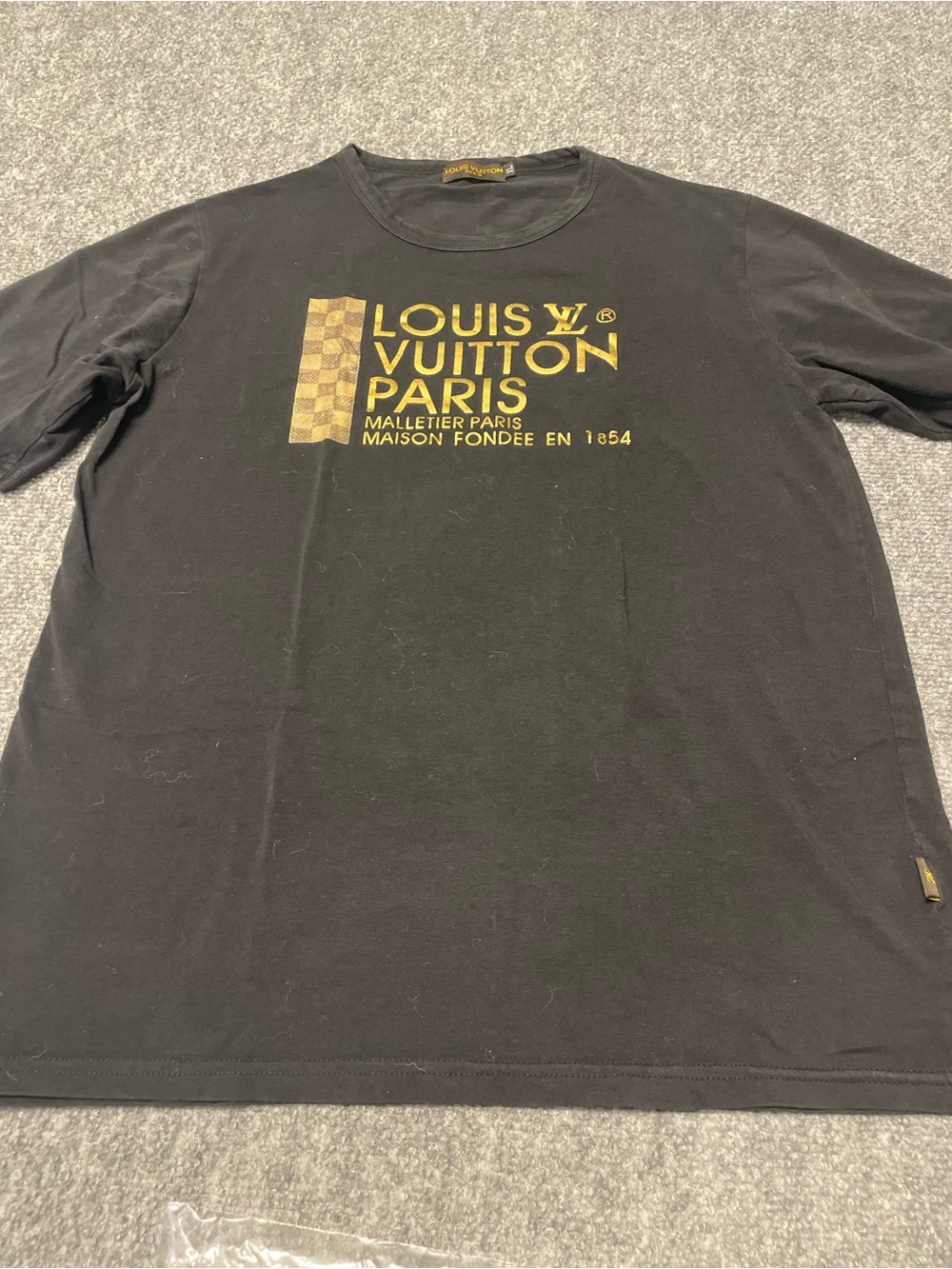 Black Tee with Gold Accents